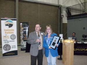 woman receiving an award